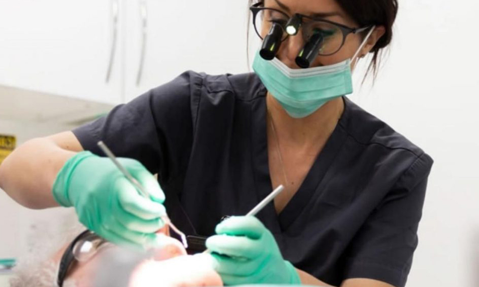 Love Teeth clinician at work — precision composite bonding by hand